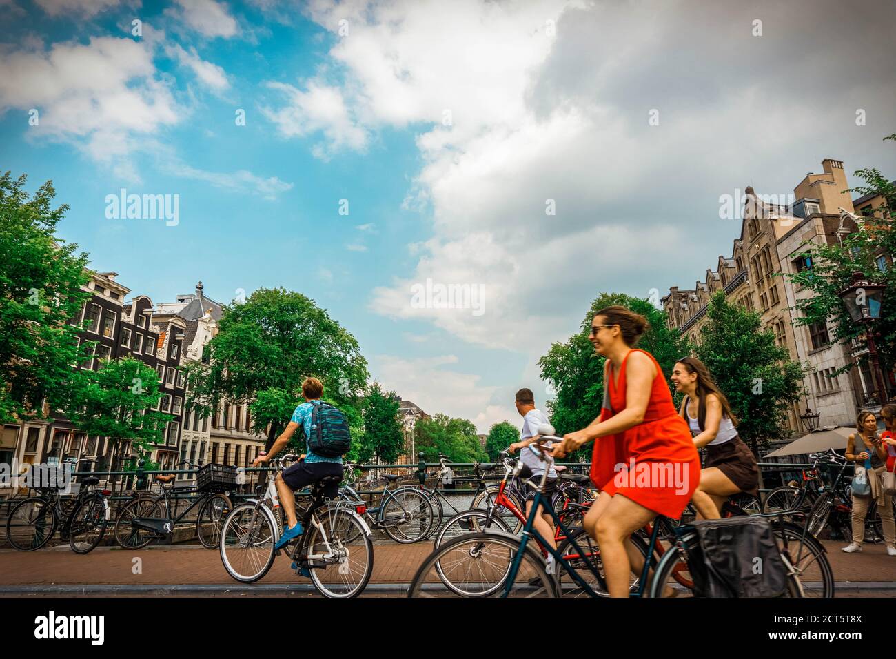 Riding a Bike on Summer in Amsterdam Stock Photo