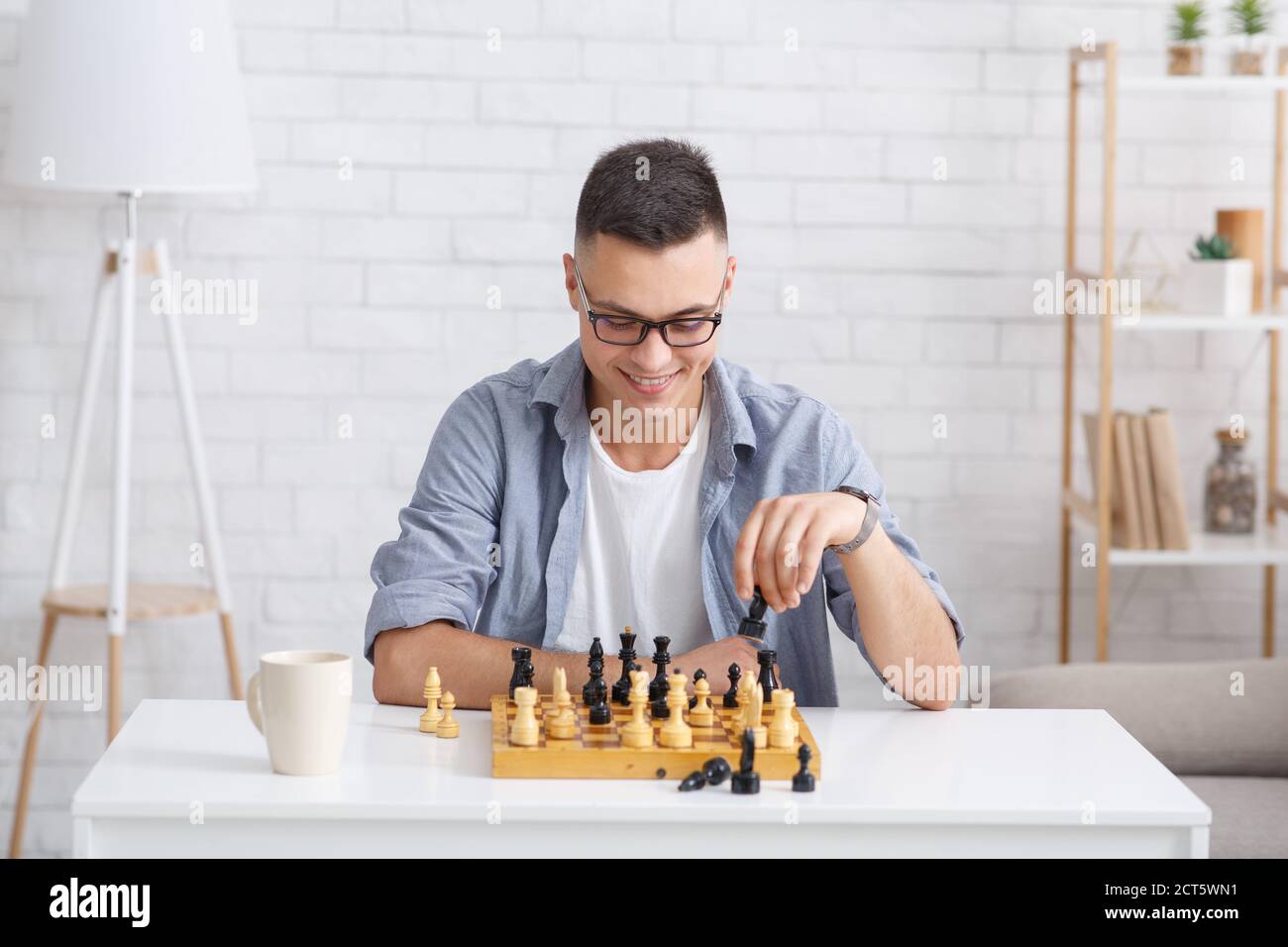 Japanese Man Playing Virtual Chess With Friend Online During Social  Distancing Times High-Res Stock Photo - Getty Images