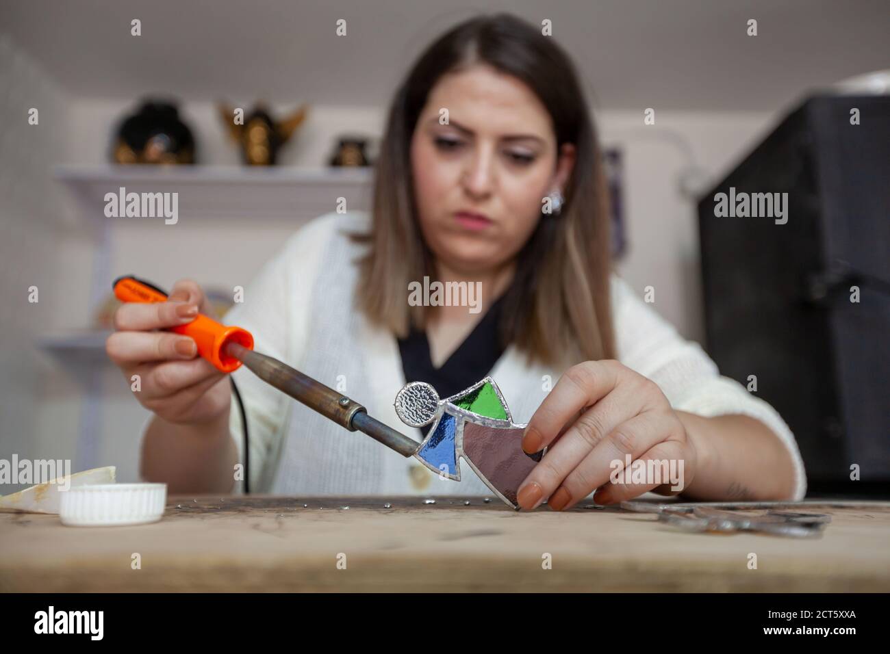 Bethlehem, West Bank city of Bethlehem. 21st Sep, 2020. Palestinian artist Dalia Murra, 27, works on a stained glass artwork at her workshop in the West Bank city of Bethlehem, Sept. 21, 2020. Credit: Luay Sababa/Xinhua/Alamy Live News Stock Photo