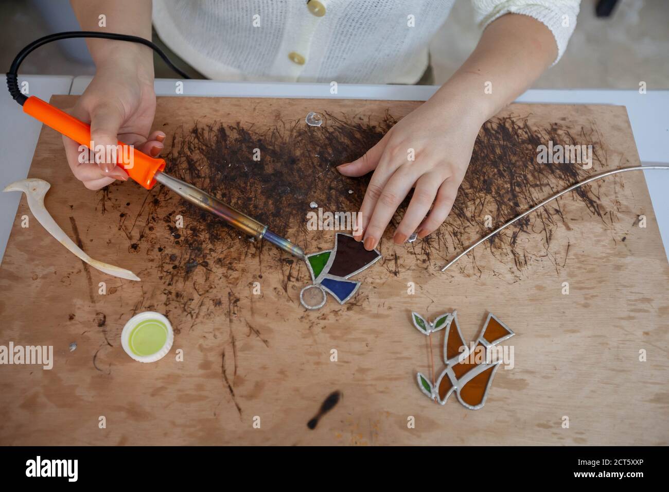 Bethlehem, West Bank city of Bethlehem. 21st Sep, 2020. Palestinian artist Dalia Murra, 27, works on stained glass artworks at her workshop in the West Bank city of Bethlehem, Sept. 21, 2020. Credit: Luay Sababa/Xinhua/Alamy Live News Stock Photo