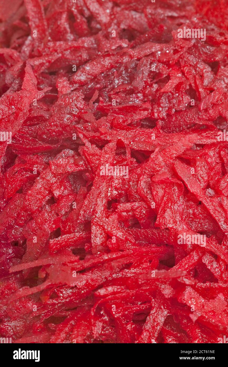 Freshly grated beetroot background with selective focus Stock Photo
