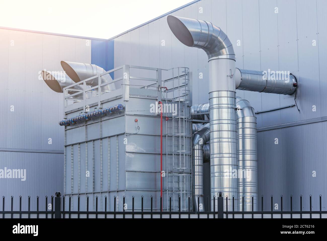 Pipes of the air conditioning system by the plant building Stock Photo