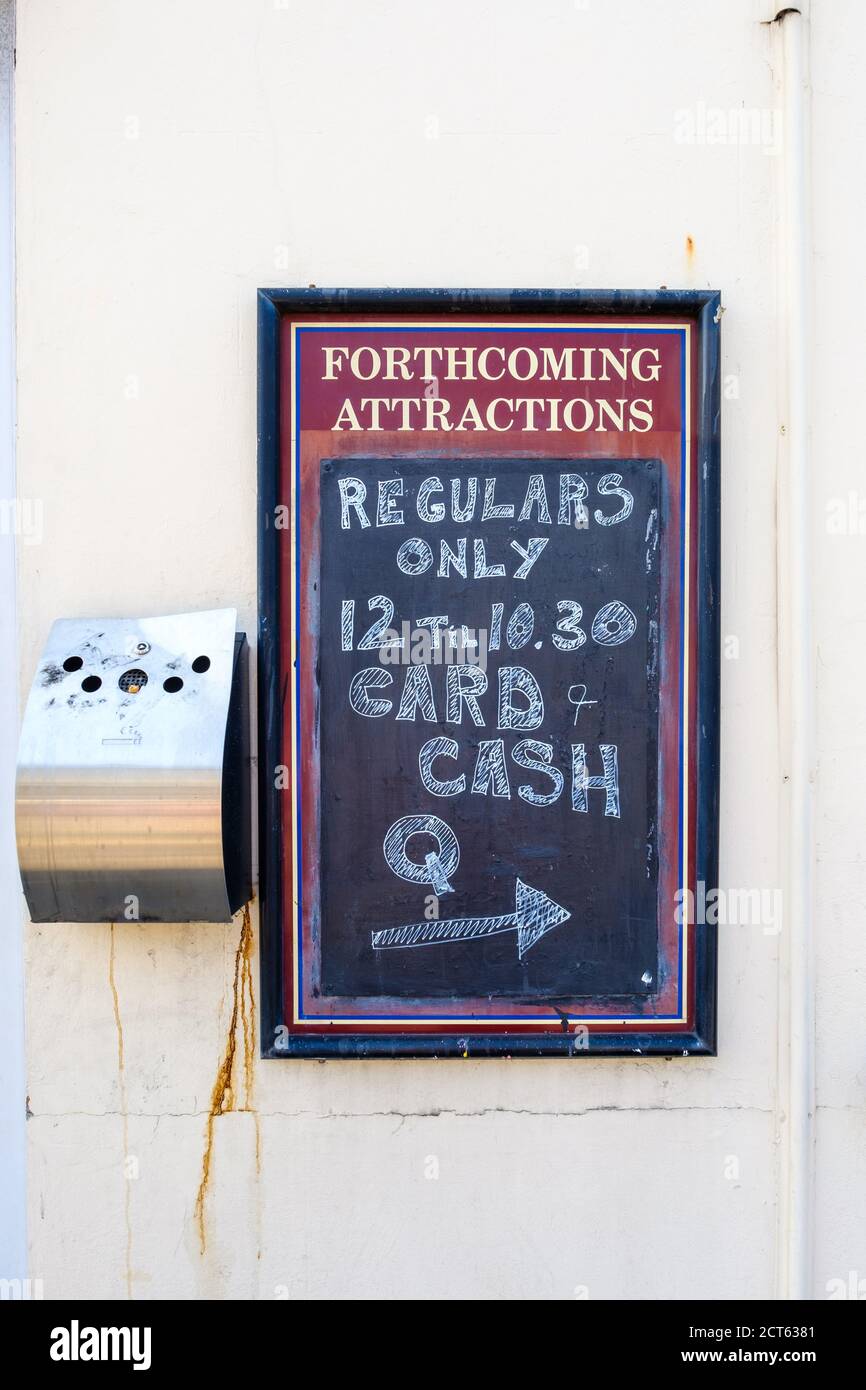 Sign outside a pub stating 'regulars only' during coronavirus restrictions - Bristol, UK Stock Photo