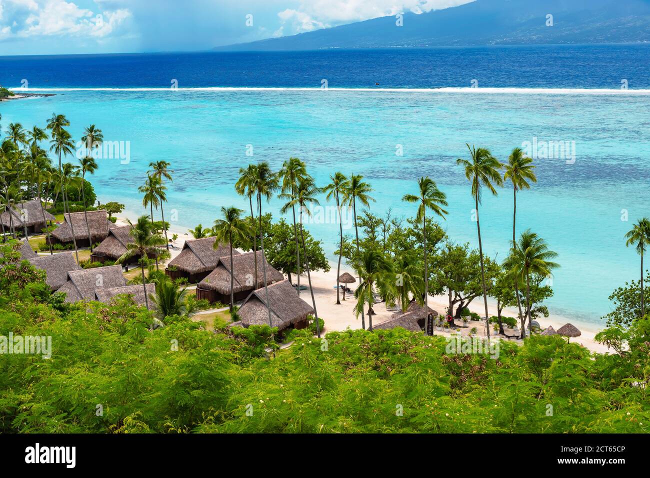 Luxury travel vacation with beach villas on Moorea Island. Stock Photo