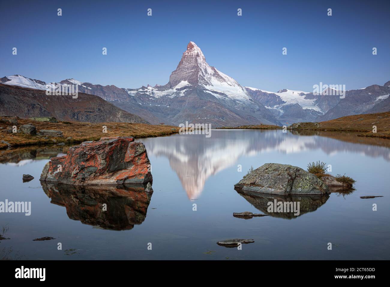 Matterhorn, Swiss Alps. Landscape image of Swiss Alps with Stellisee and Matterhorn in the background during sunrise. Stock Photo