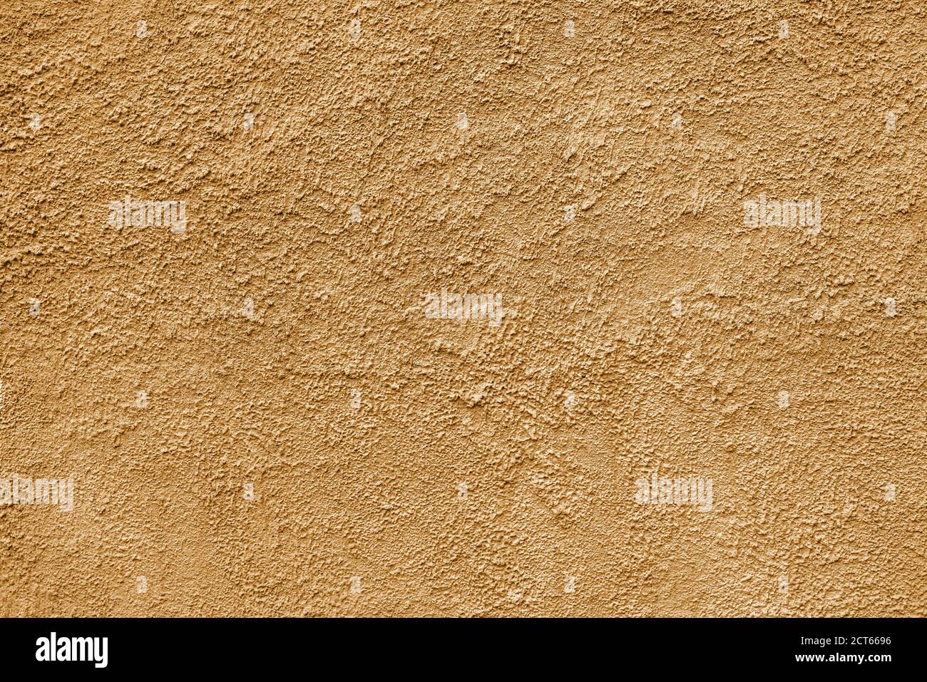 Abstract rough beige texture. Architectural abstract background. Plastered building wall. Stock Photo