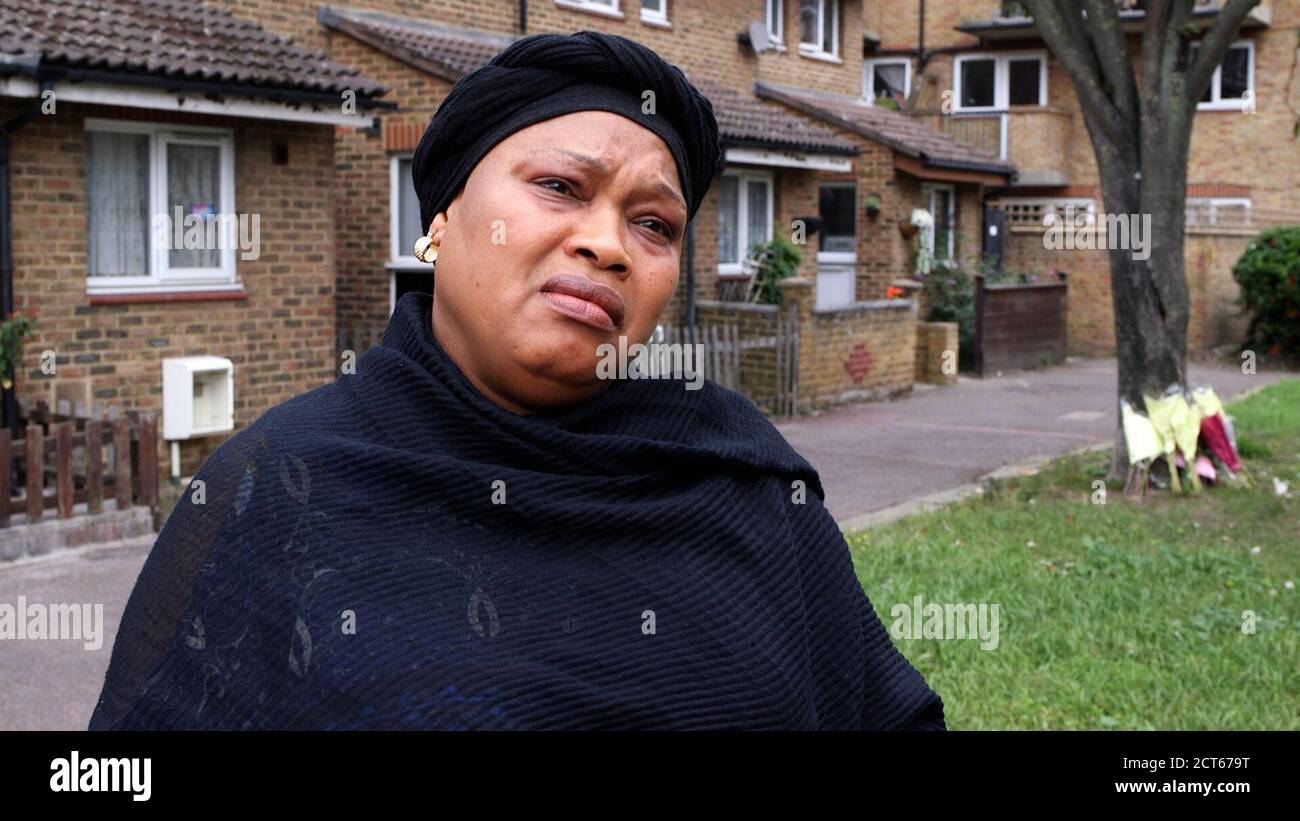 Mariama Baby Kamara, the mother of murdered teenager Mohamed Dura-Ray, revisiting the scene of her son's killing in Canterbury Place, Kennington, following the five-year anniversary of his death. Stock Photo