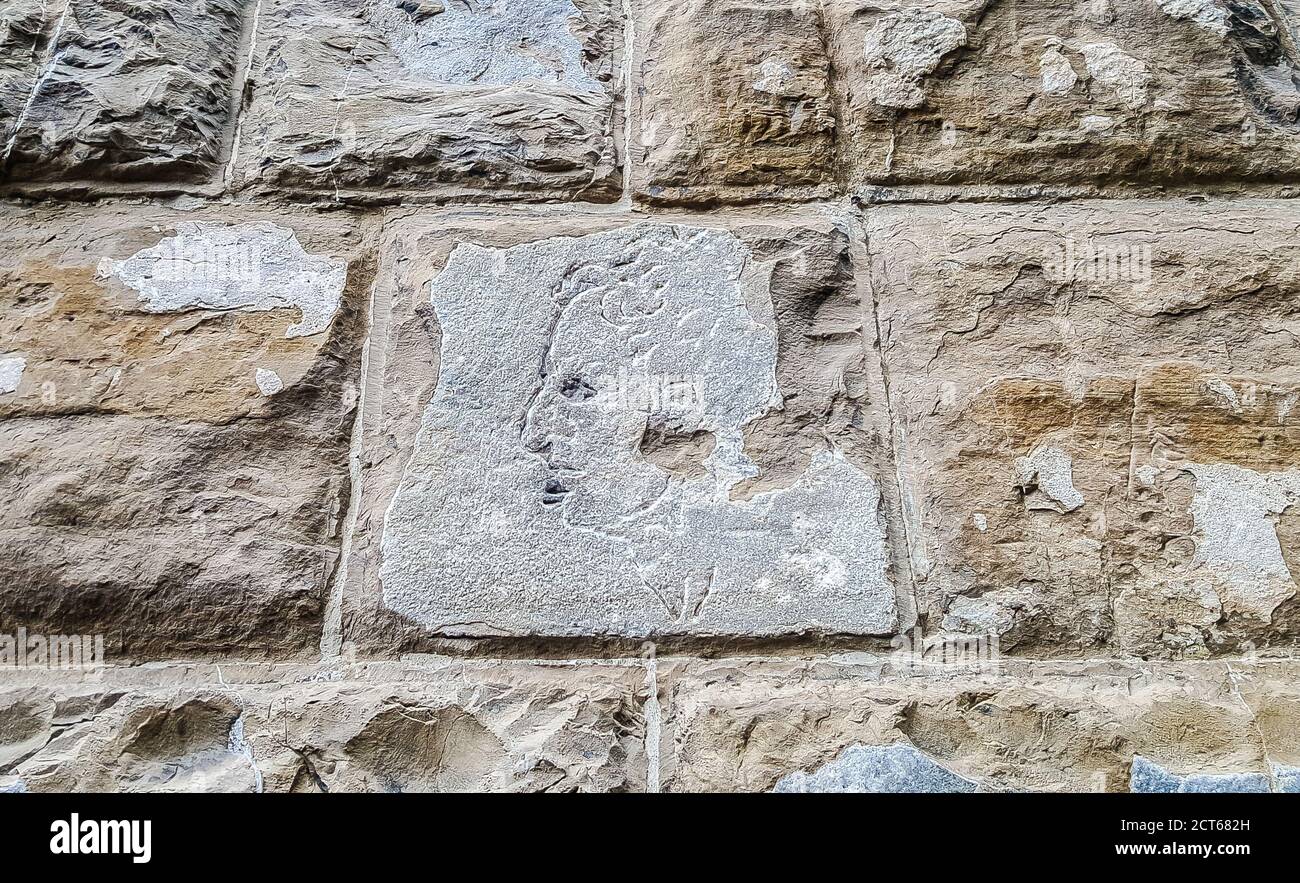 Carved stone face on wall hi-res stock photography and images - Alamy