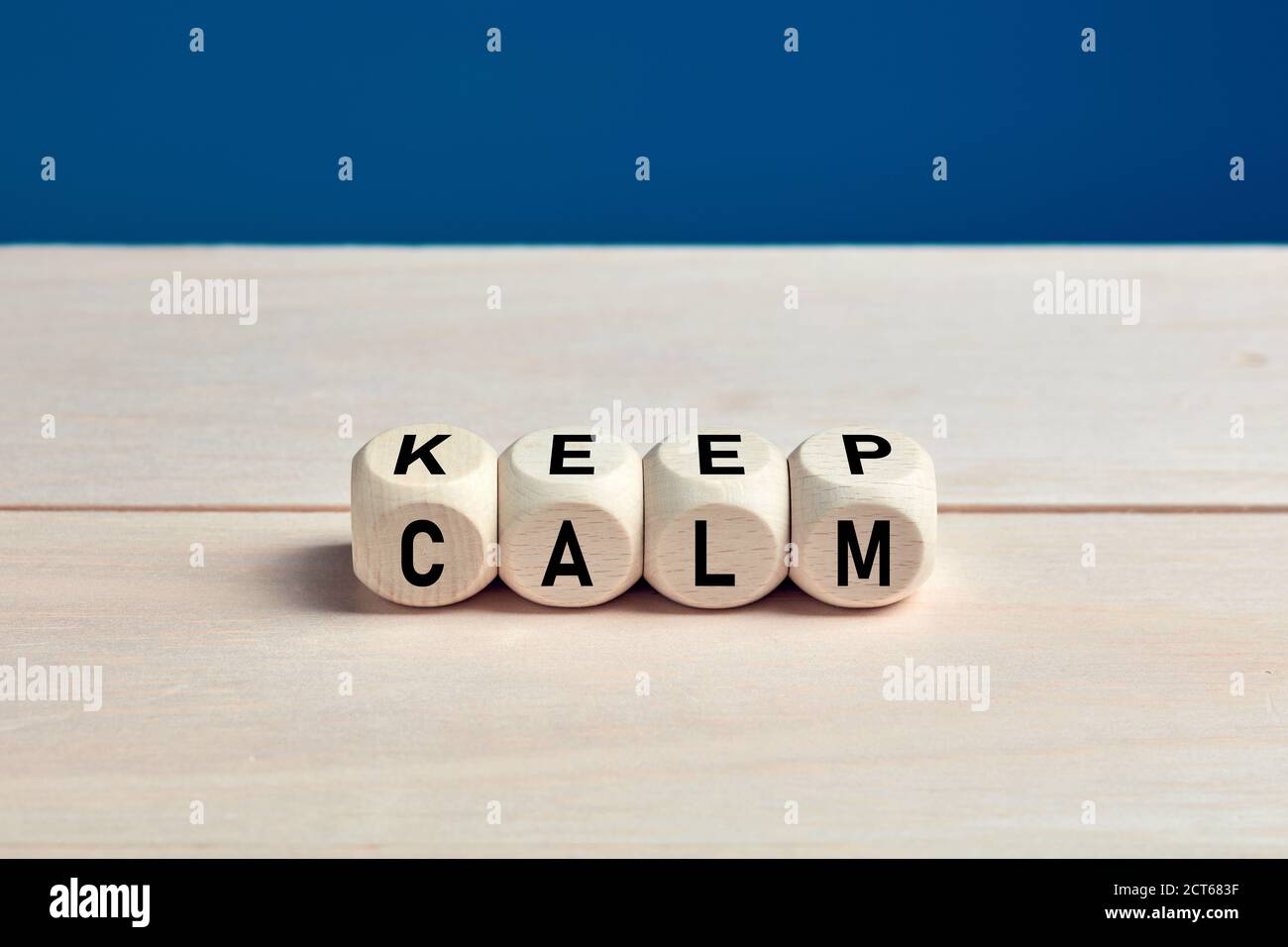 Keep calm concept or message on wooden cubes. Stock Photo