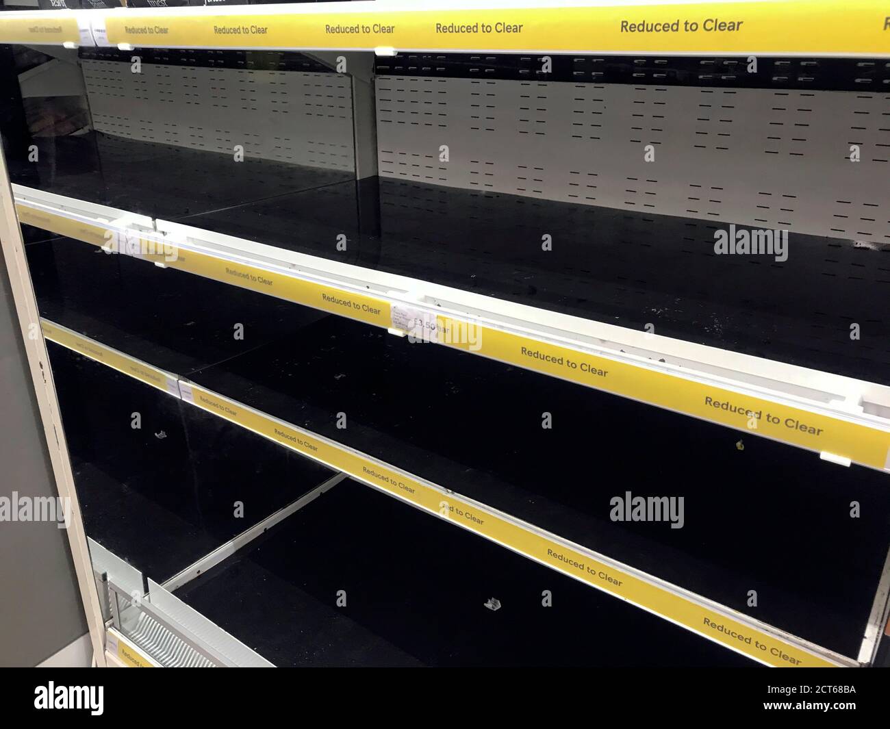 Empty shelves in the Reduced to Clear aisle at the Portsmouth North