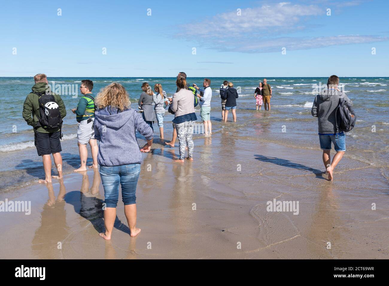 Skagen, Denmark - August 31, 2020: At, Grenen, the northernmost point of Denmark, where Baltic Sea and North Sea waves meet, tourists are watching, po Stock Photo