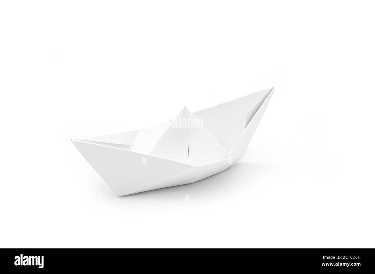 Paper ship as origami isolated on white, concept idea Stock Photo