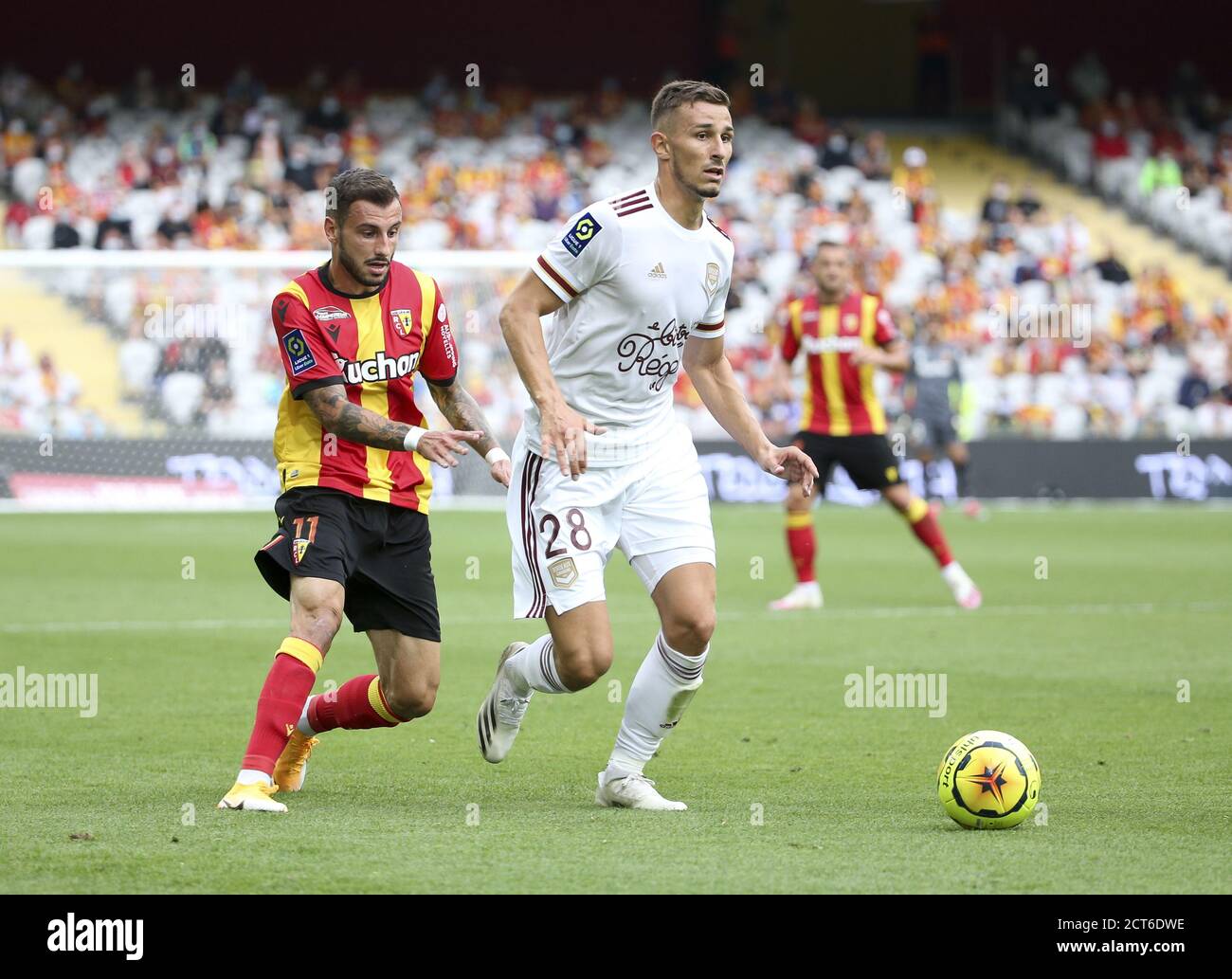 Remi Oudin of Bordeaux, Jonathan Clauss of Lens (left) during the French championship Ligue 1 football match between RC Lens and Girondins de Bordeaux Stock Photo