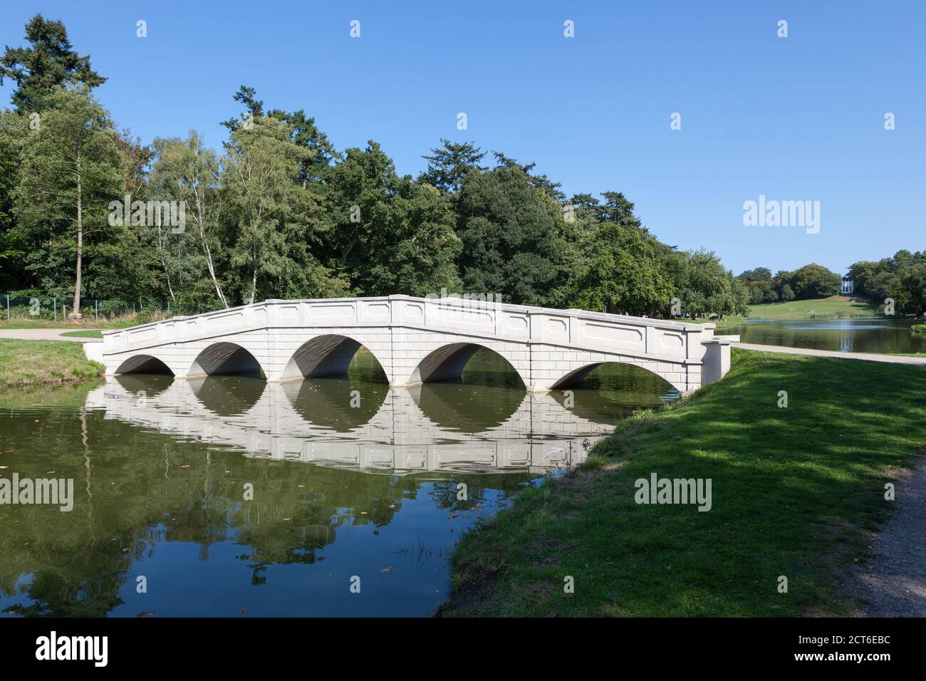 View of the five arch bridge at Painshill Park, an 18th Century English Landscape Garden, Surrey. Stock Photo