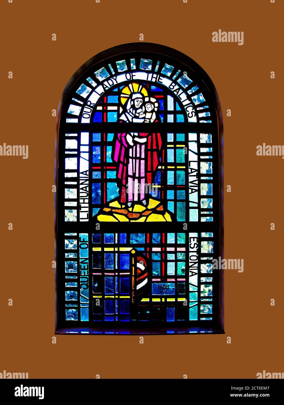 Our Lady of the Baltics stained glass window; Lithuana; Latvia; Estonia; religious art; colorful; Our Lady of Lourdes Catholic Church; Florida; Venice Stock Photo