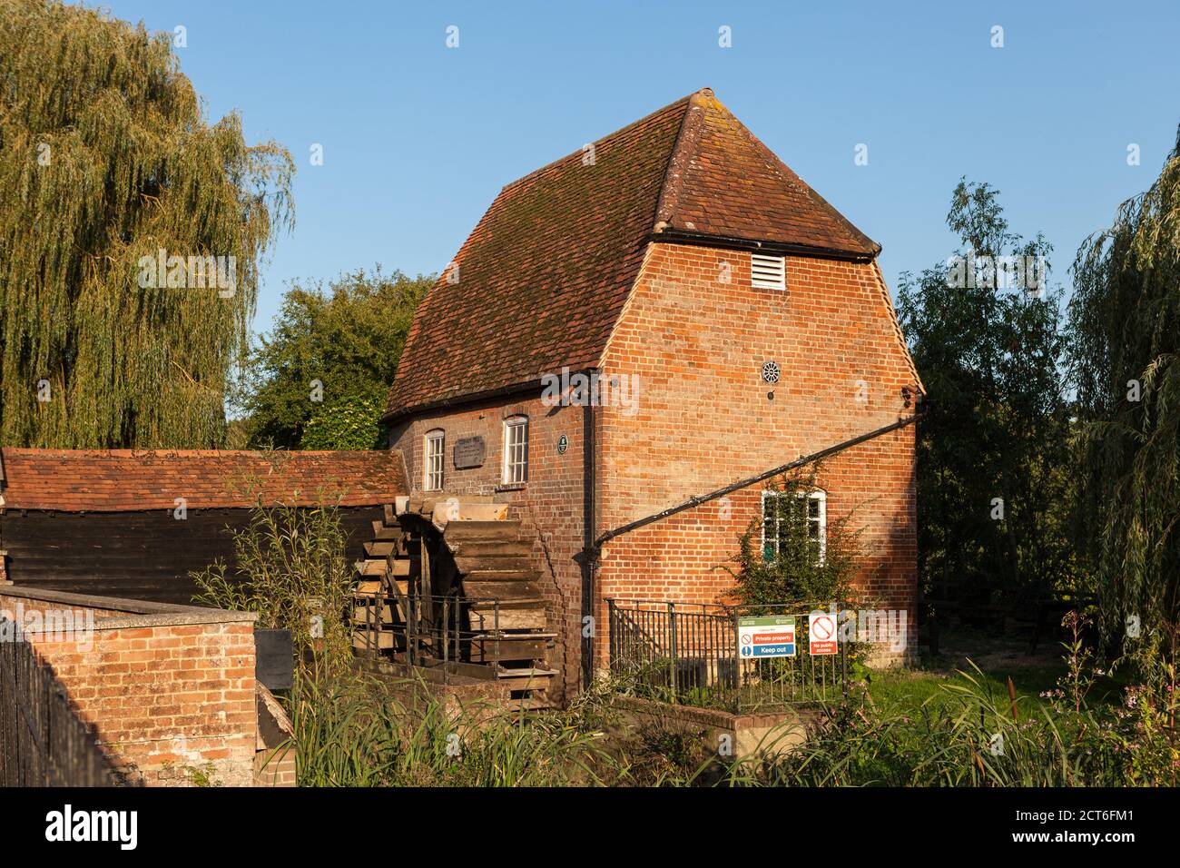 Picturesque early 19th century mill, situated in delightful surroundings on the banks of the River Mole in Cobham, Surrey. Stock Photo