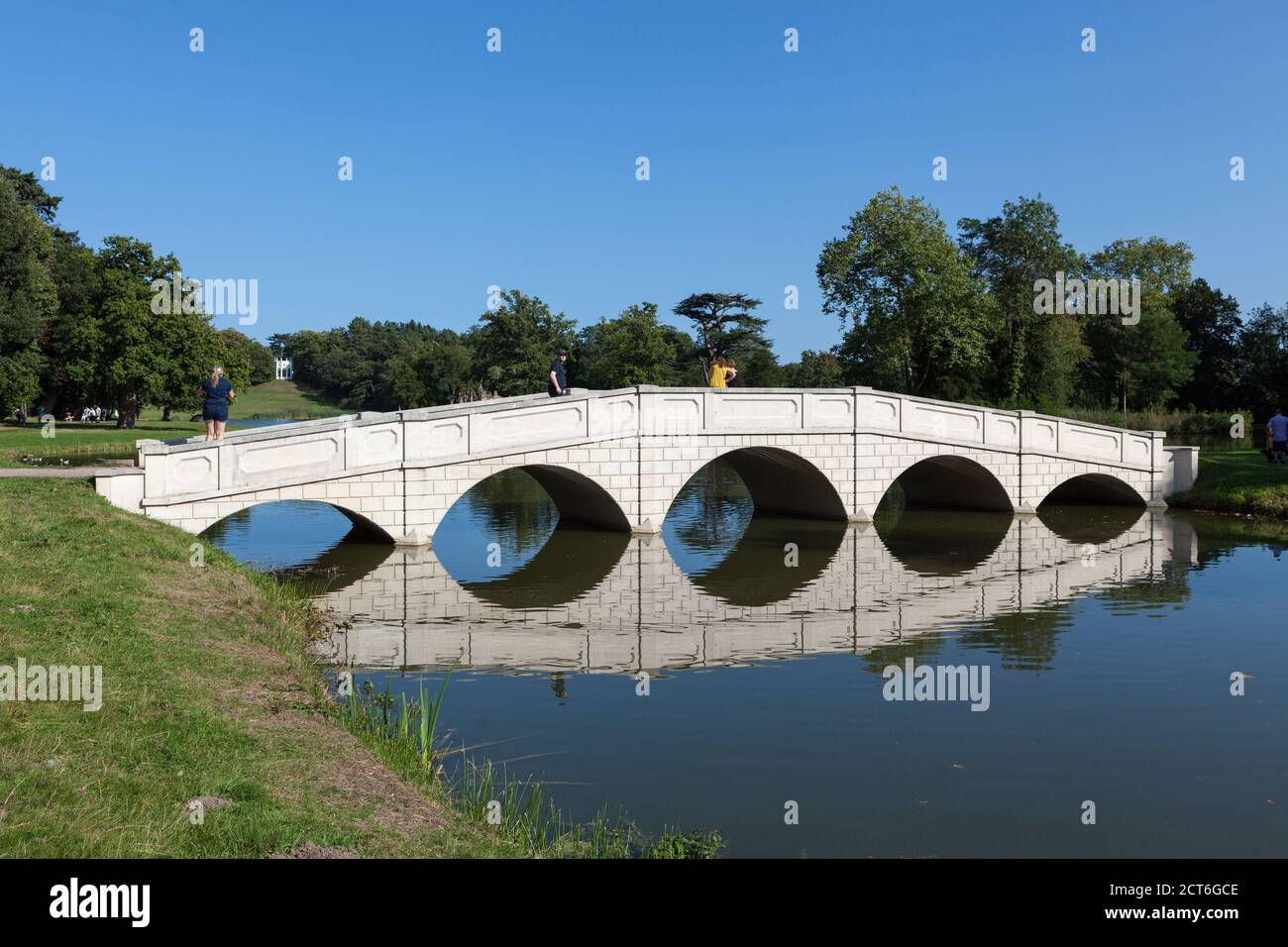 View of the five arch bridge at Painshill Park, an 18th Century English Landscape Garden, Surrey. Stock Photo