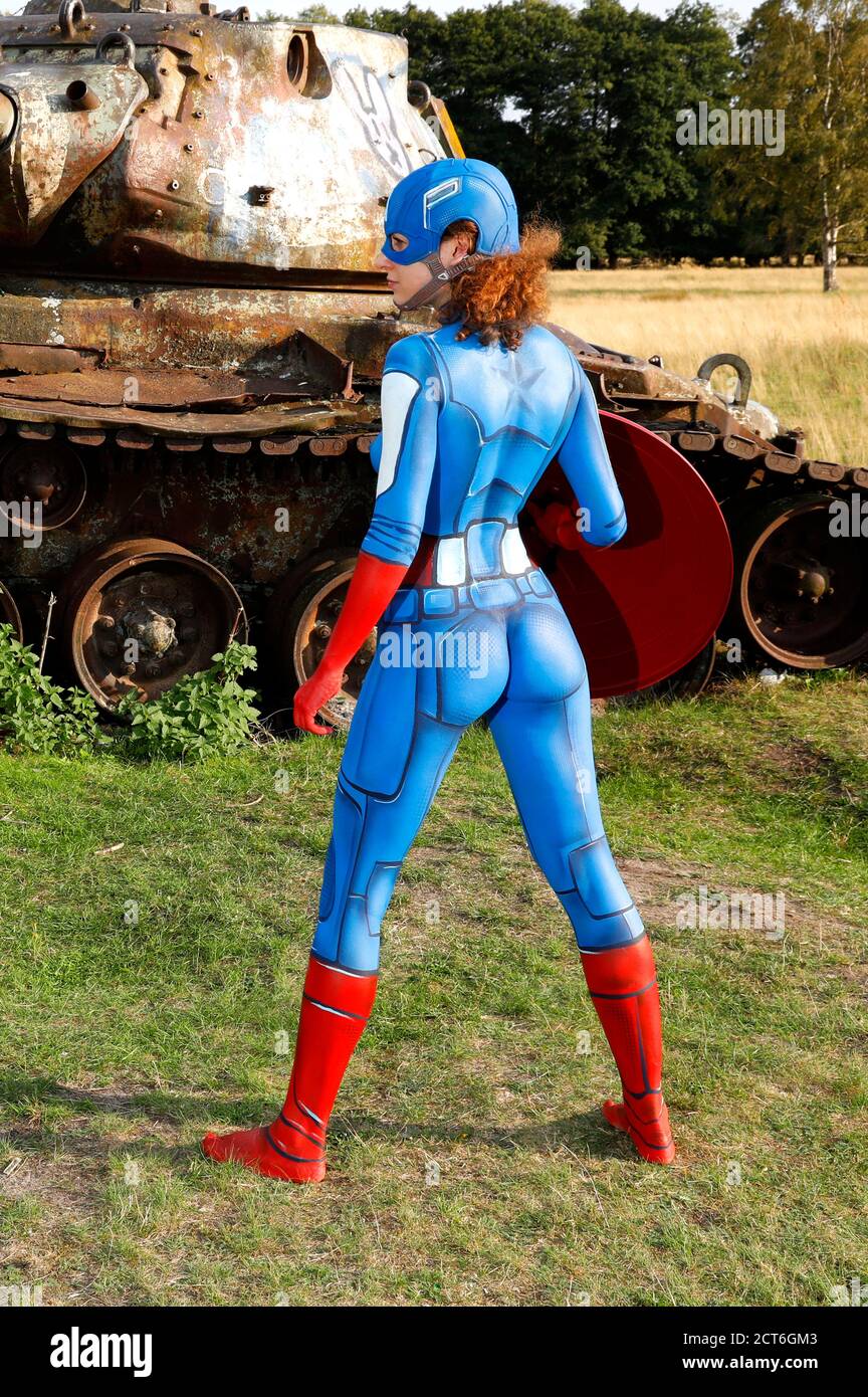 GEEK ART - Bodypainting and Transformaking: Captain America vs. Red Skull photoshooting with Lena Kiel on a military training area in Langenhagen on September 20, 2020 - A project by the photographer Tschiponnique Skupin and the bodypainter Enrico Lein Stock Photo