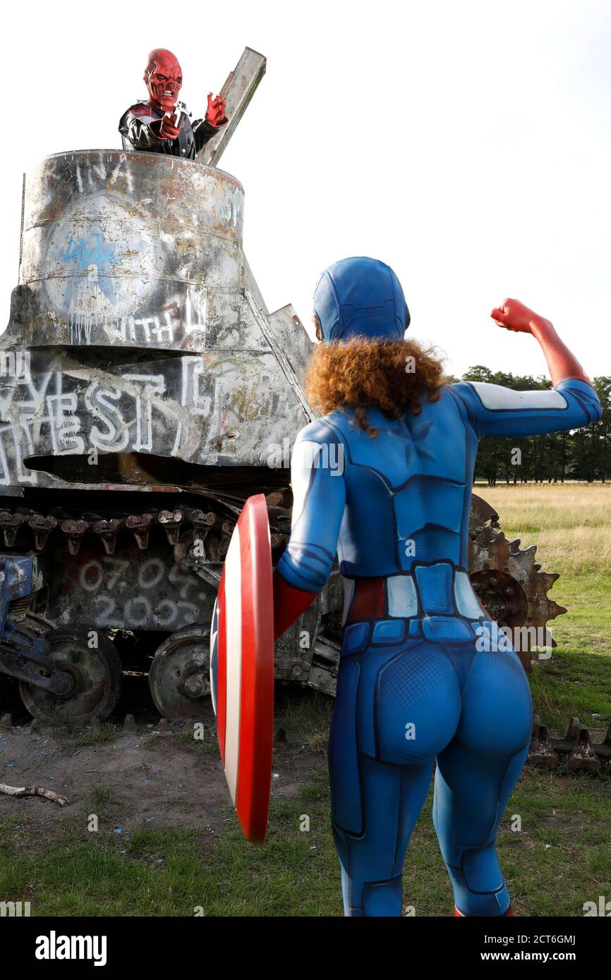 GEEK ART - Bodypainting and Transformaking: Captain America vs. Red Skull photoshooting with Lena Kiel and Patrick Kiel on a military training area in Langenhagen on September 20, 2020 - A project by the photographer Tschiponnique Skupin and the bodypainter Enrico Lein Stock Photo