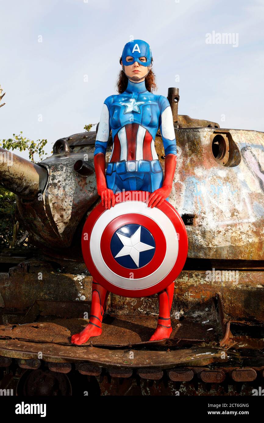 GEEK ART - Bodypainting and Transformaking: Captain America vs. Red Skull photoshooting with Lena Kiel on a military training area in Langenhagen on September 20, 2020 - A project by the photographer Tschiponnique Skupin and the bodypainter Enrico Lein Stock Photo