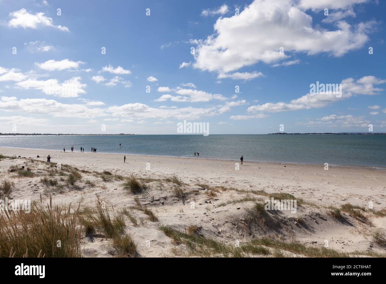 Remote sandy beach on Thorney Island that juts into Chichester Harbour in West Sussex. Stock Photo