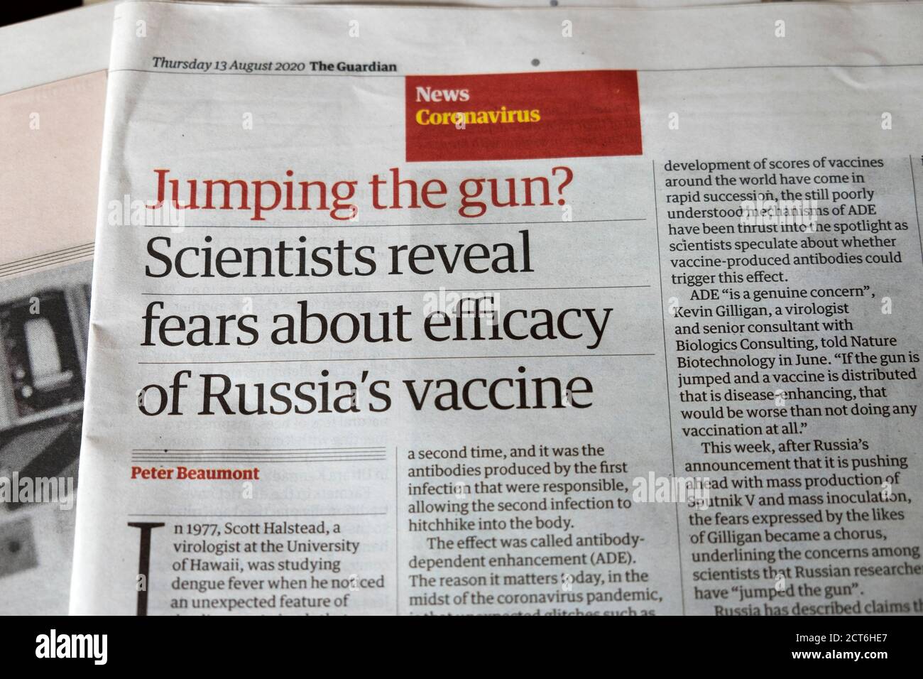 'Jumping the gun? Scientists reveal fears about efficacy of Russia's vaccine' Coronavirus news in Guardian newspaper article  13 August 2020 London UK Stock Photo