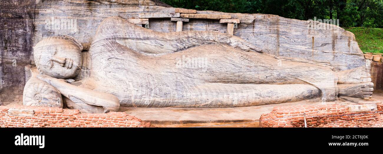 Ancient City of Polonnaruwa, reclining Buddha in Nirvana at Gal Vihara Rock Temple (Gal Viharaya), UNESCO World Heritage Site, Sri Lanka, Asia Stock Photo