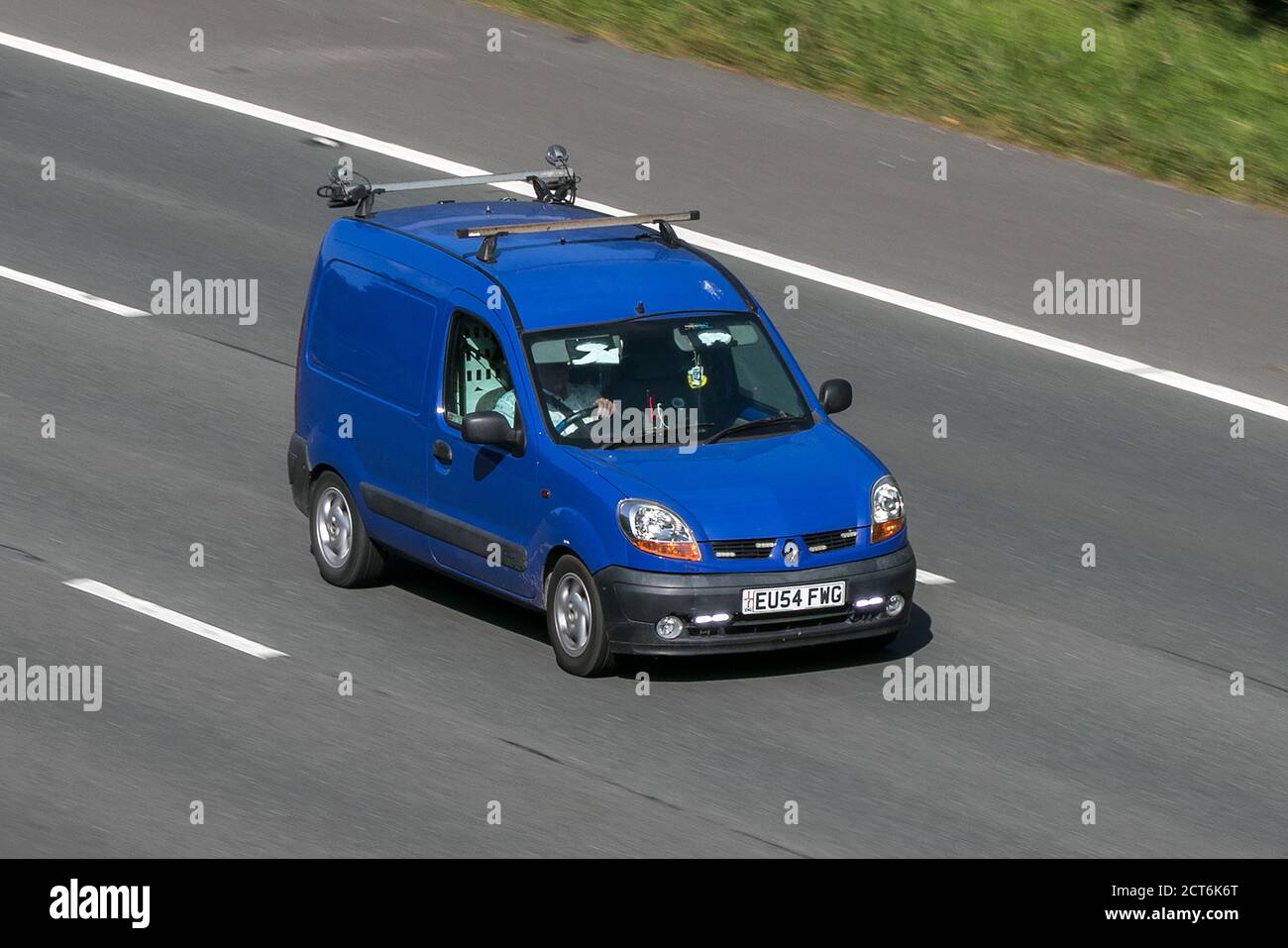 2004 Renault Kangoo Sl19dci 70 Blue LCV Car Derived Van Diesel driving on the M6 motorway near Preston in Lancashire, UK Stock Photo