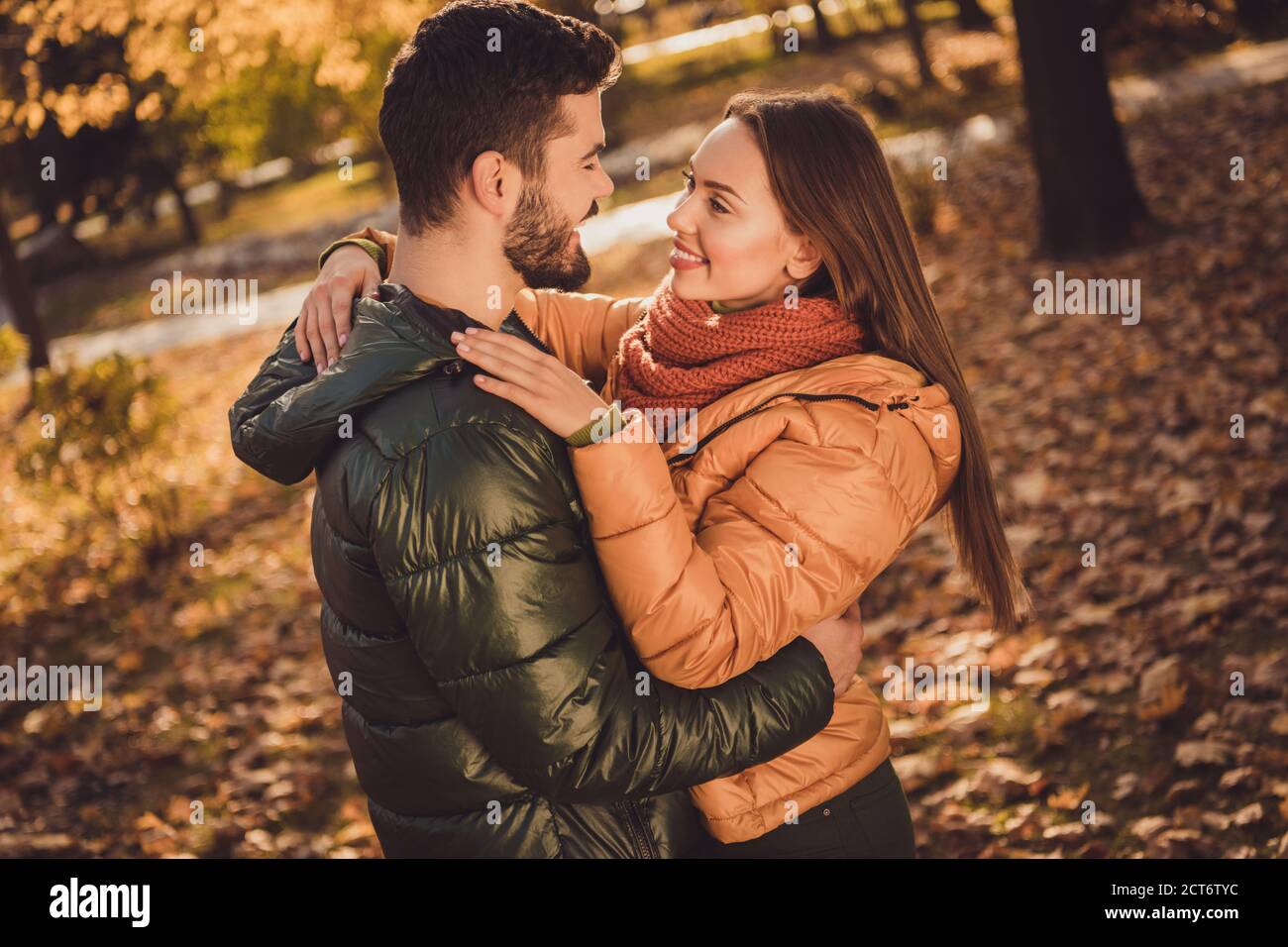 Photo of passionate affectionate couple girl hug soulmate boyfriend in fall  forest september park wear jackets coats Stock Photo - Alamy
