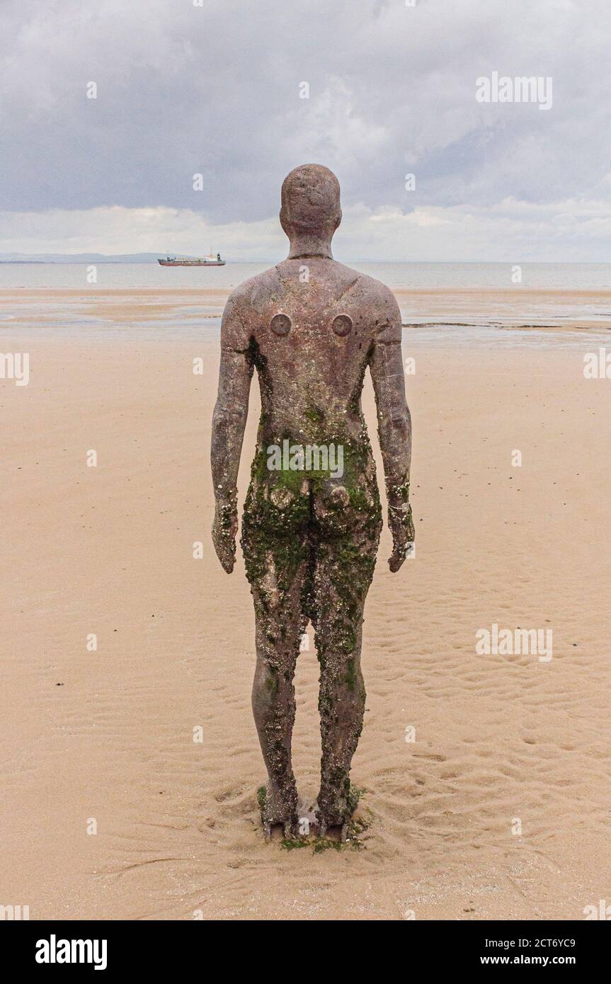 Art installation Another Place by Sir Antony Gormley at Mariners Road, Crosby Beach, Liverpool, Merseyside L23 6SX: Phillip Roberts Stock Photo