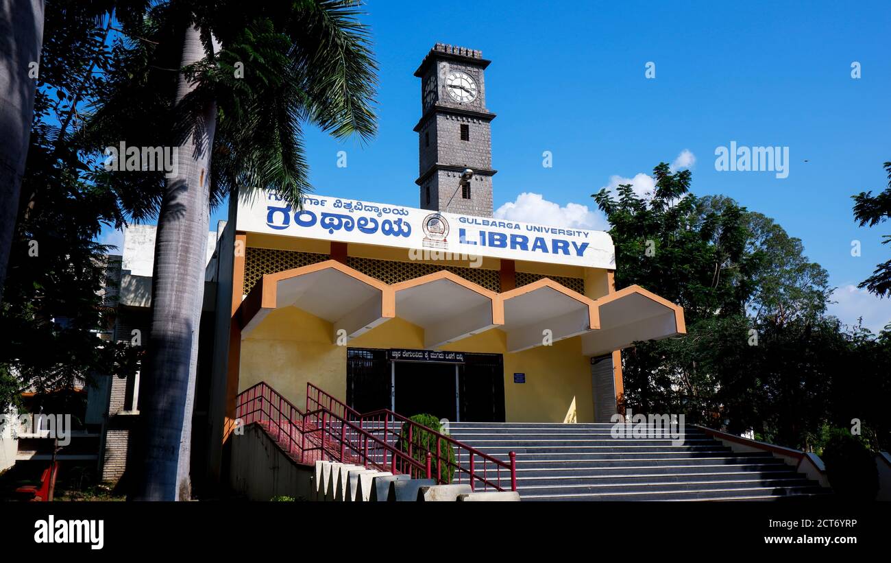 Kalaburagi, Karnataka/India-September 03.2020: low angle shot of gulbarga university library building with clock tower isolated in nature Stock Photo