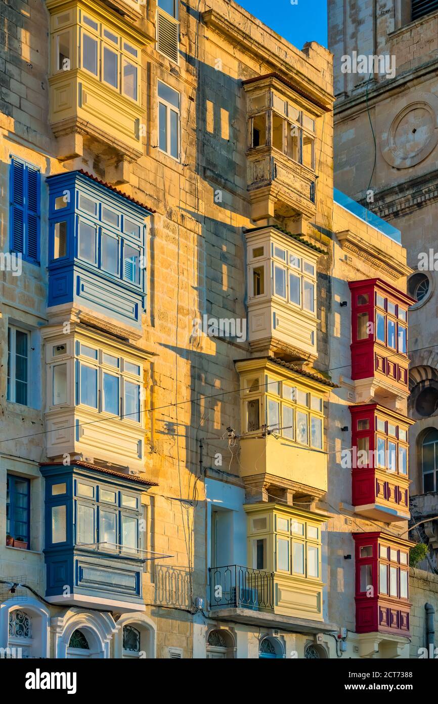 Traditional balconies in old town Valletta Malta Stock Photo