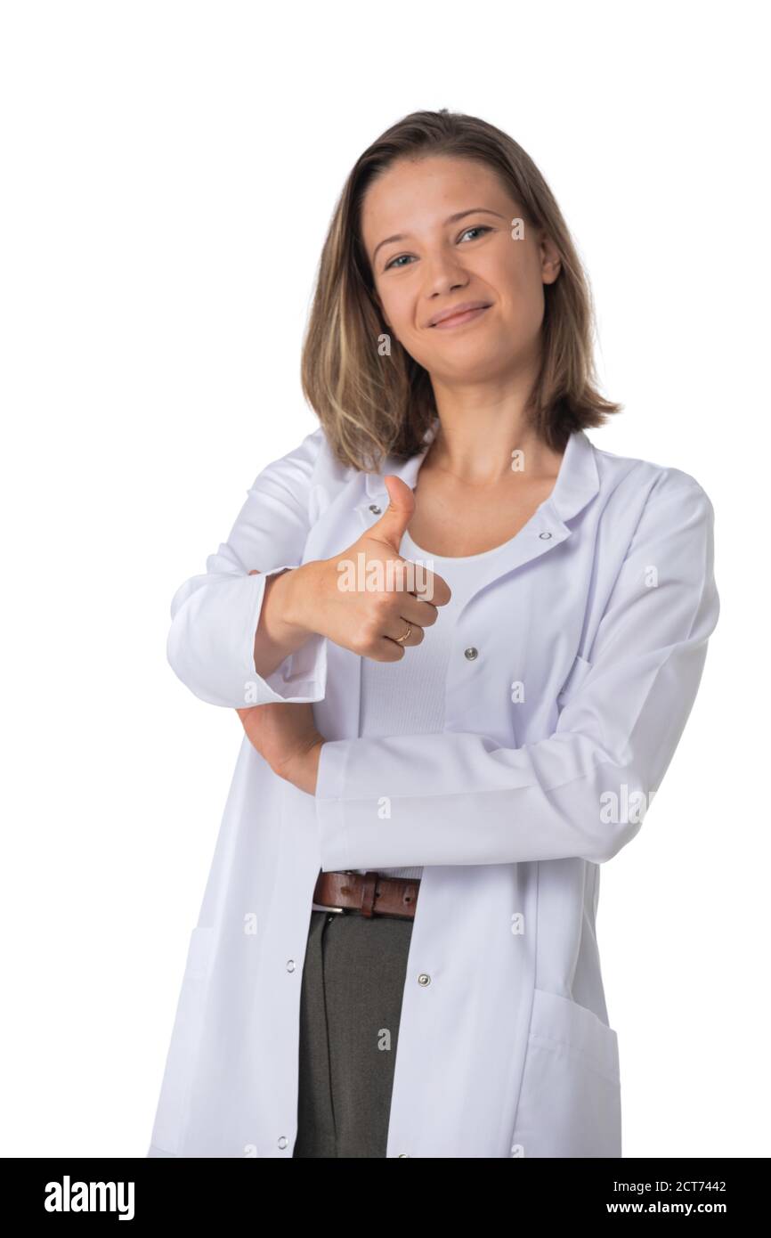 Portrait of female medical doctor showing thumb up and smiling isolated on white background Stock Photo