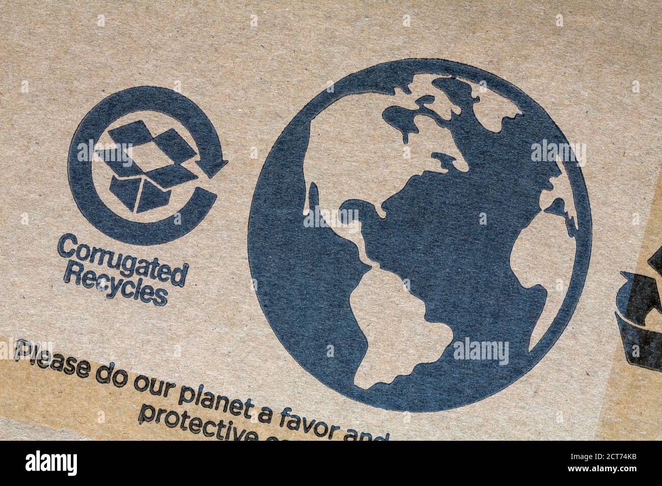 Corrugated recycles symbol logo and earth globe detail on recyclable