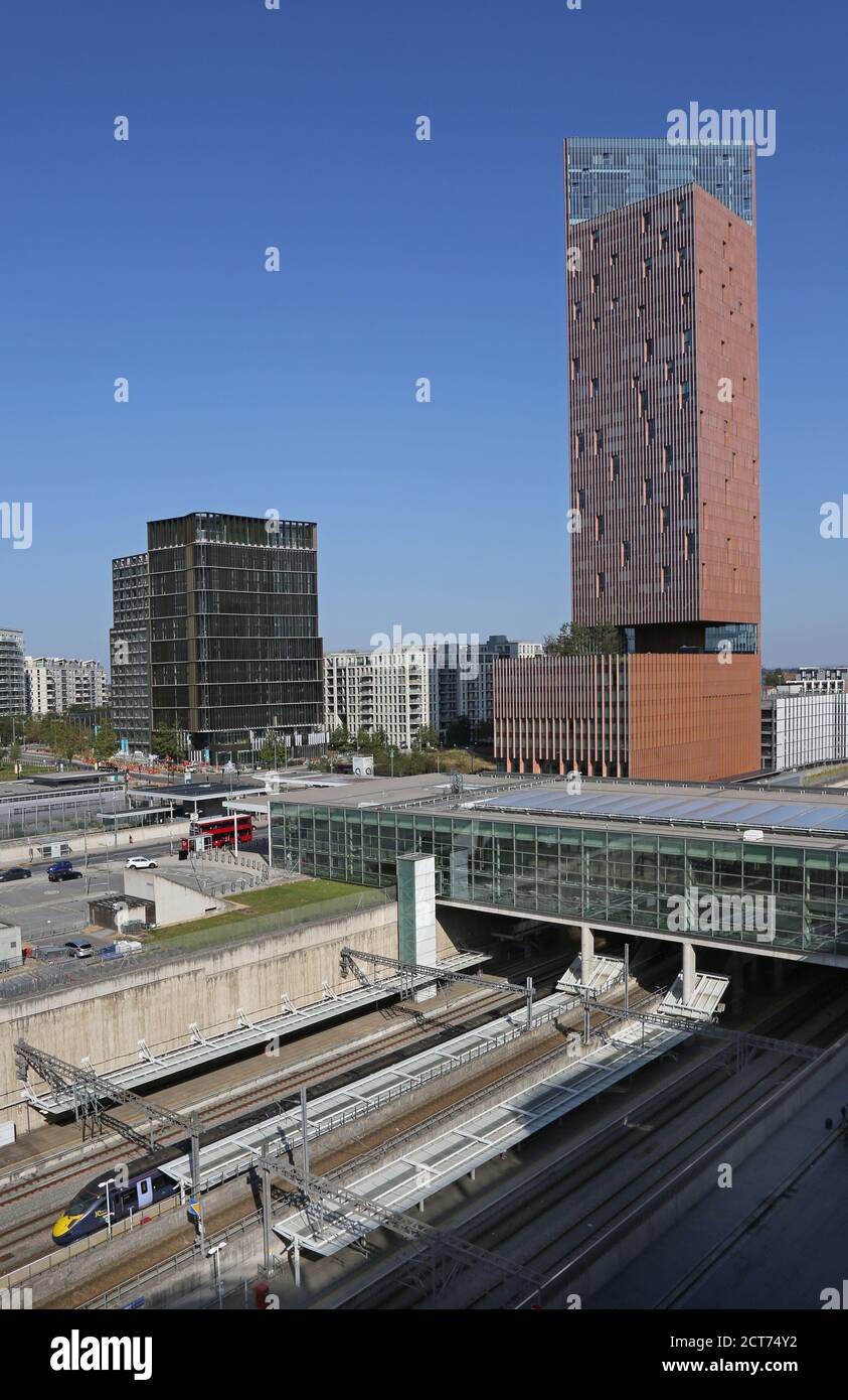 High level view of Stratford International railway station in east London, UK. Shows the Manhattan Loft Gardens tower beyond (right) by SOM Architects Stock Photo
