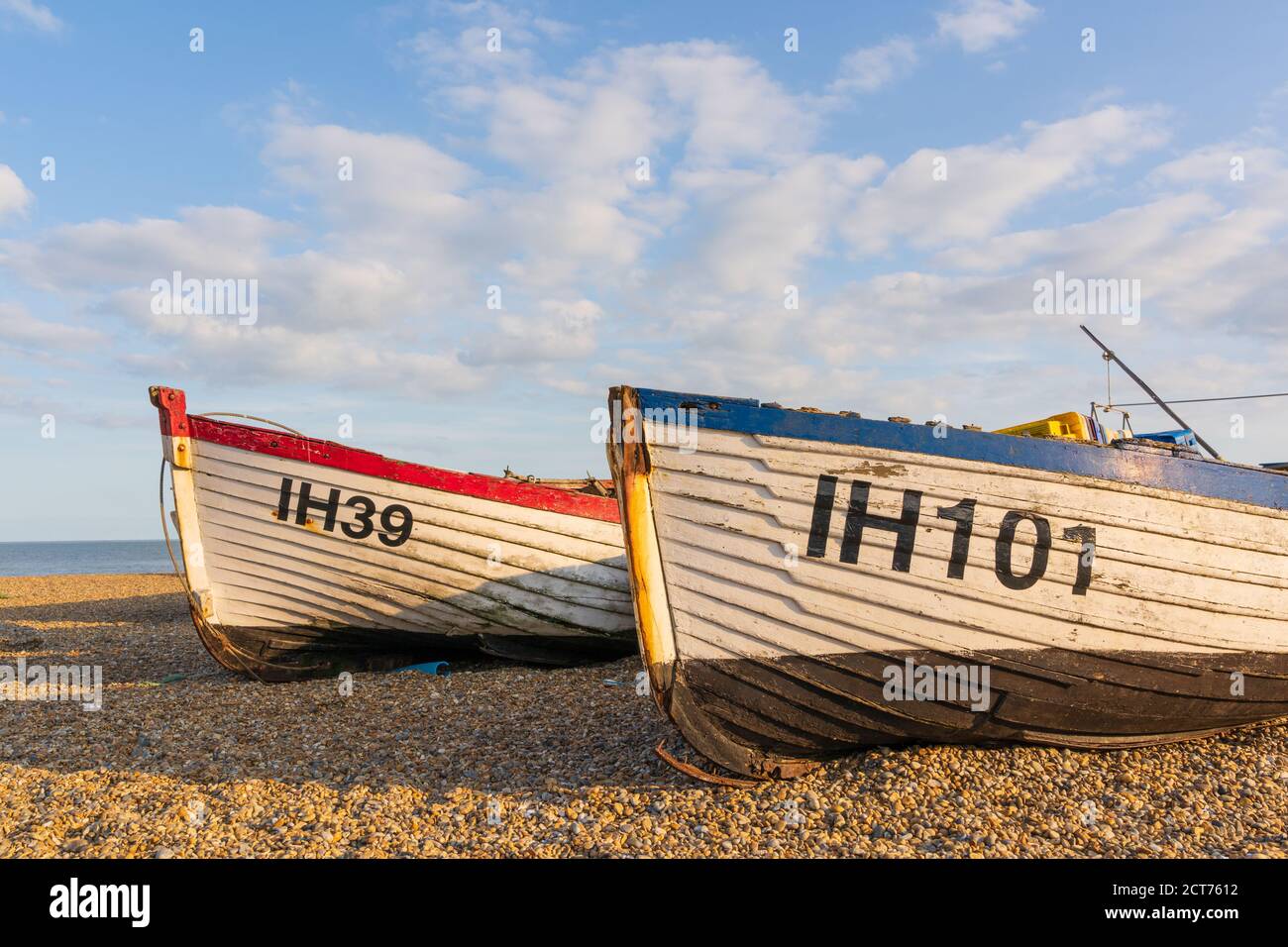 Aldeburgh, Suffolk. UK. 2020. Abandoned fishing boats on Aldeburgh Beach in a beautiful evening light. Stock Photo