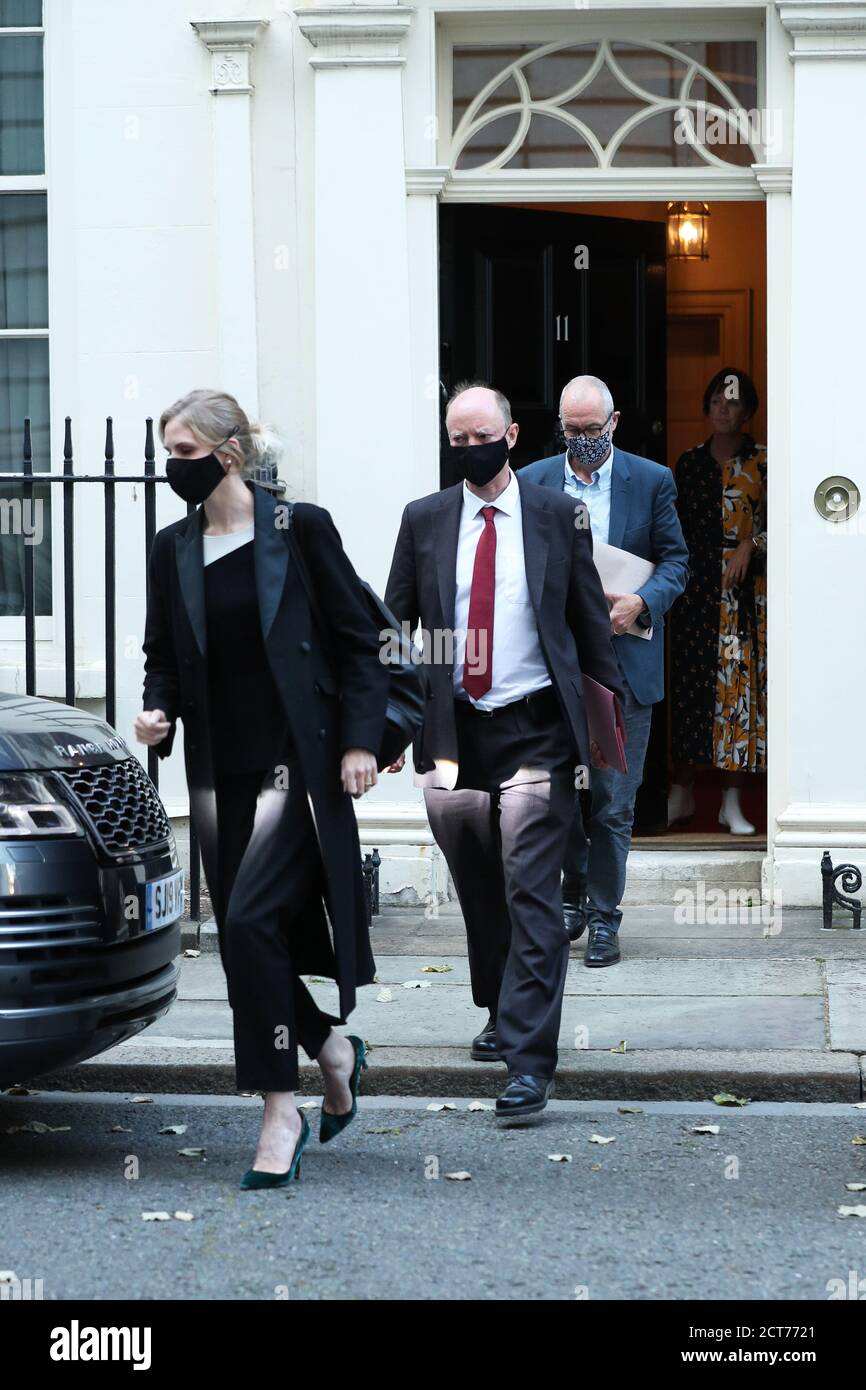 (left to right) Senior aide Cleo Watson, the government's chief medical officer Chris Whitty and chief scientific adviser Sir Patrick Vallance leave 11 Downing Street, Westminster, London. Stock Photo