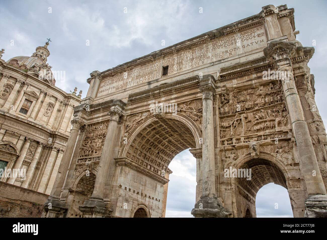 The Arch of Septimius Severus is a white marble triumphal arch. Detail from the Arch of Septimius Severus at the Forum Romanum, Rome, Italy Stock Photo