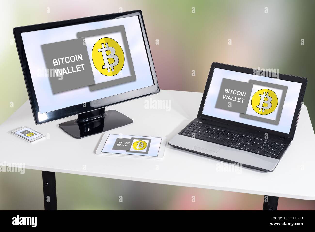 Bitcoin wallet concept shown on different information technology devices Stock Photo