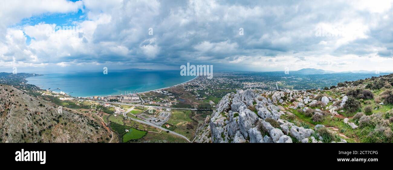 Panoramic view From a hill sea and mountains. View from mountains. Greece, Crete, Heraklion, Ammoudara. Stock Photo