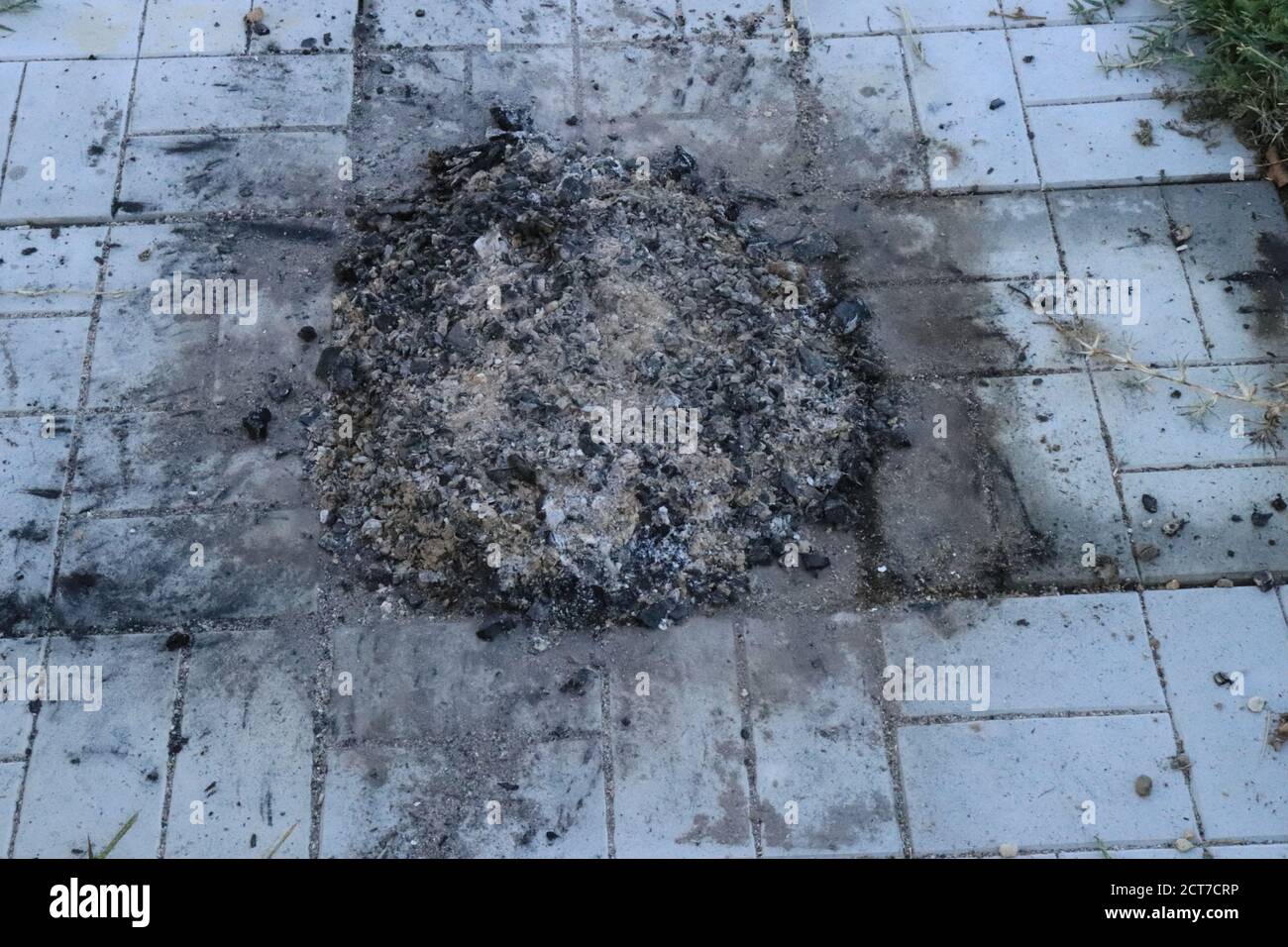 Cinders of outdoor fireplace left behind after picnics Stock Photo - Alamy