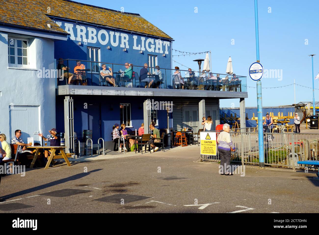 Paignton, Devon, UK.  September 13, 2020. Tourists and holidaymakers enjoying food and drink on the harbour at Paignton in Devon, UK. Stock Photo