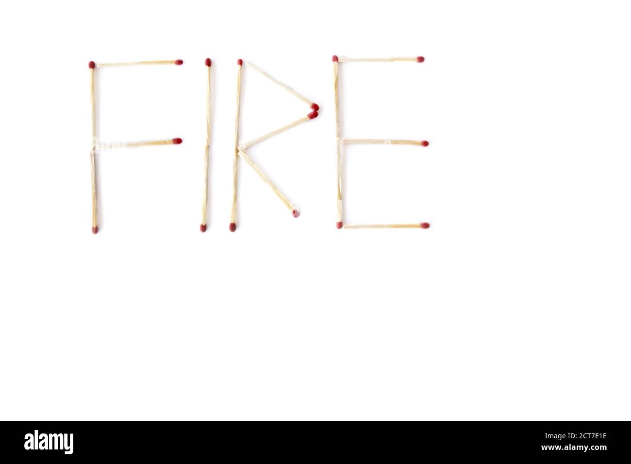 Word Fire written with matches Stock Photo