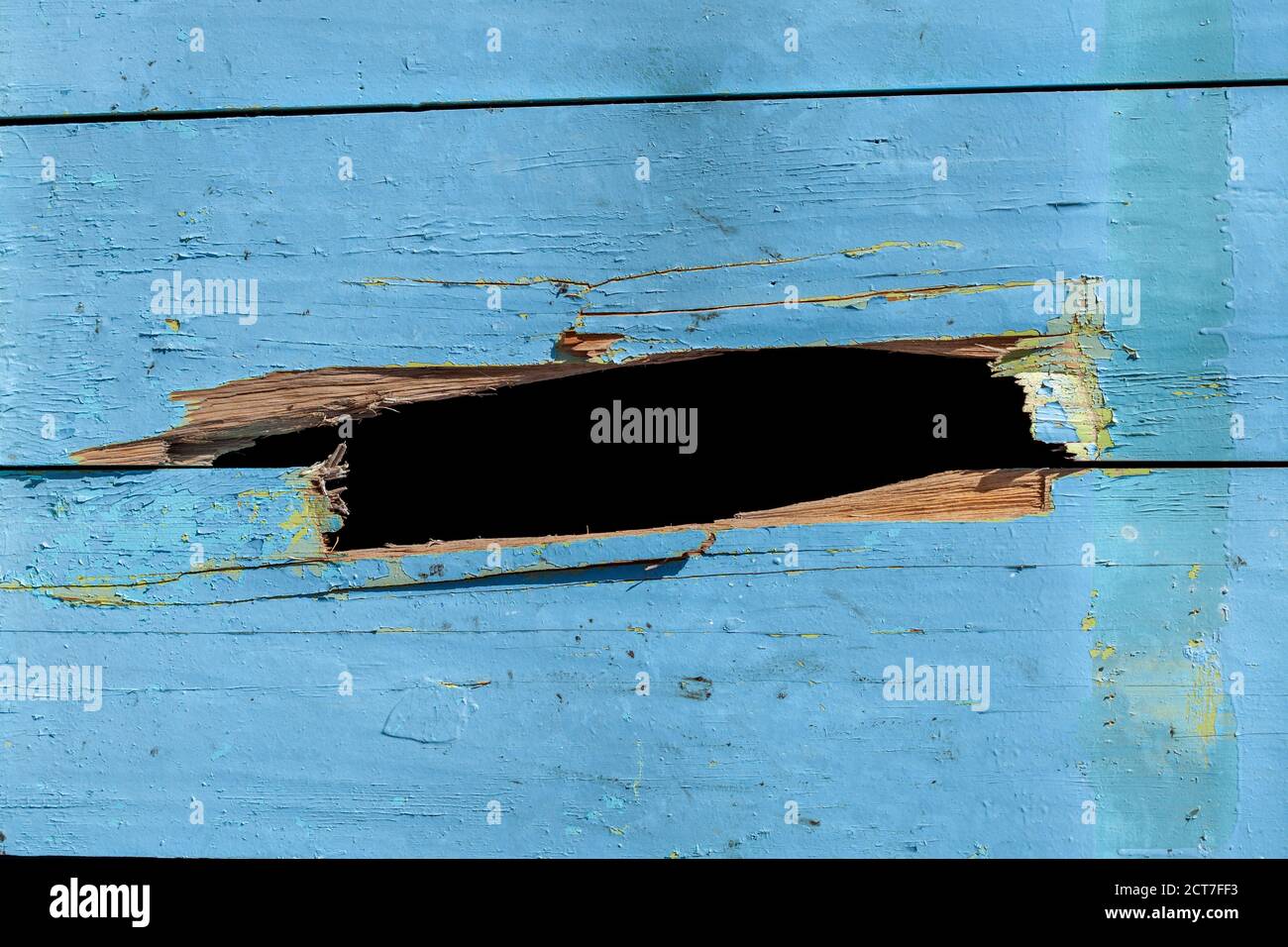 blue wooden wall with a hole. background for design Stock Photo