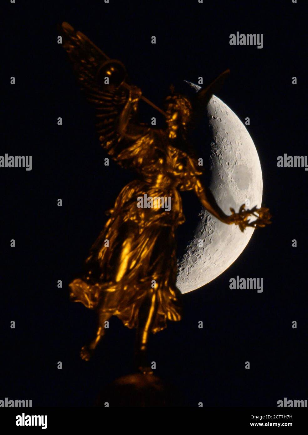 Angel with crescent moon hi-res stock photography and images