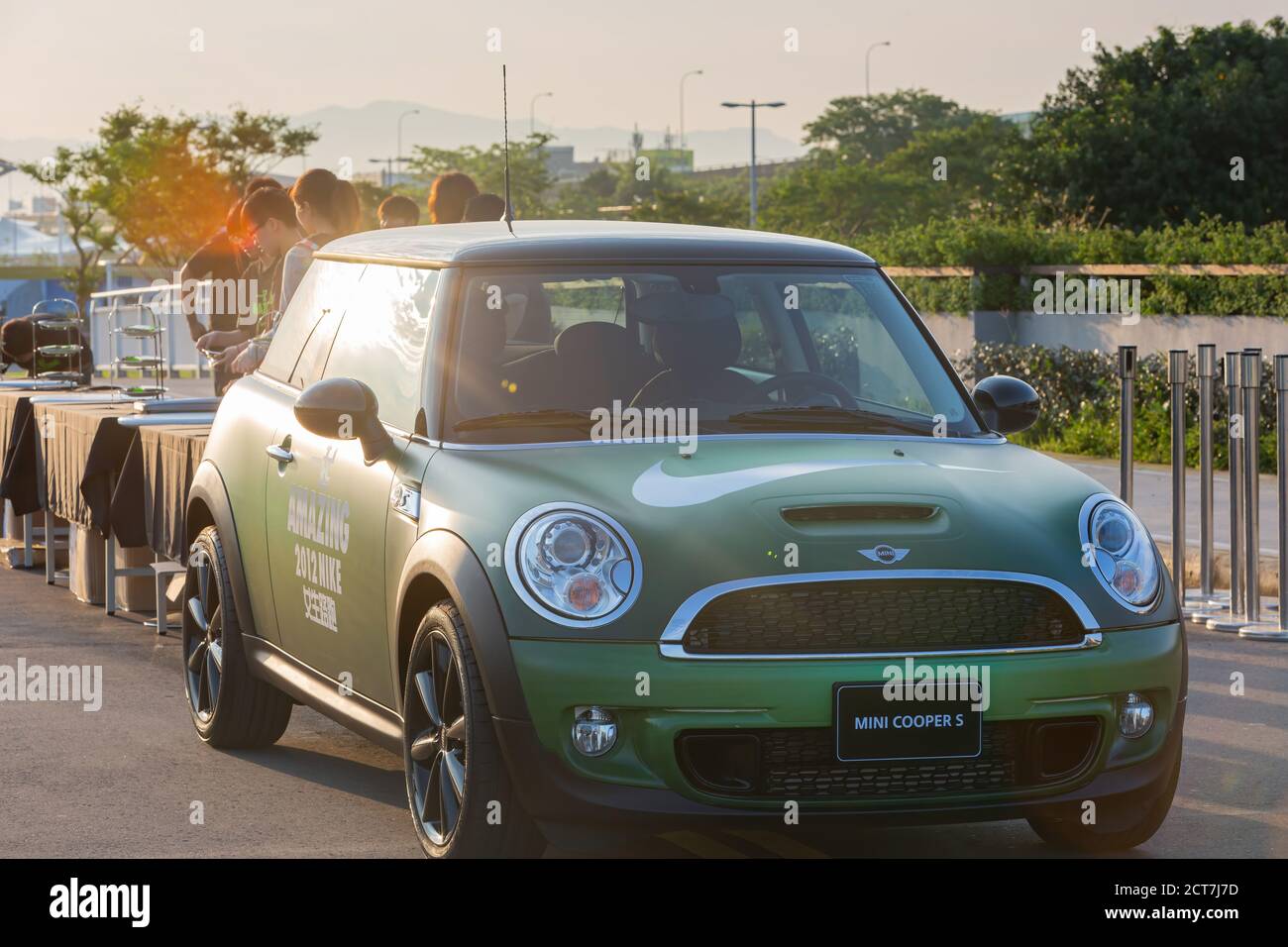 Taipei, APR 29, 2012 - Green Mini Cooper display in the Nike's Be Amazing 5K race event Stock Photo