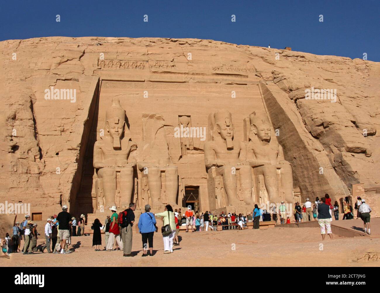 Abu Simbel in Egypt with many tourists visiting the ancient site.  Egypt, 2008 Stock Photo
