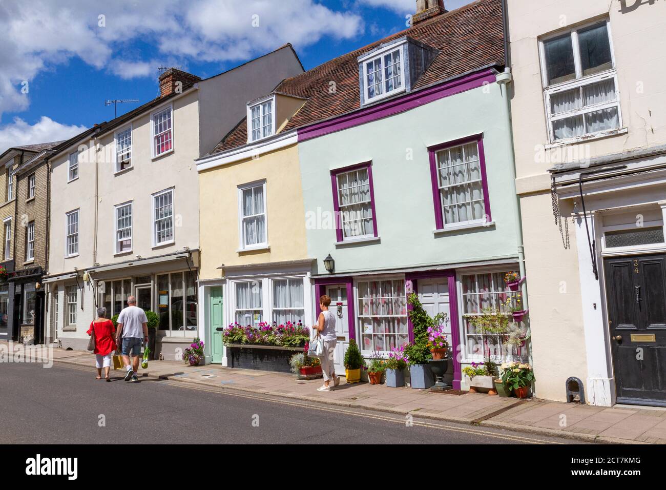 General view of small cottages and the Maison Bleue French restaurant on Churchgate Street, Bury St Edmunds, Suffolk, UK. Stock Photo