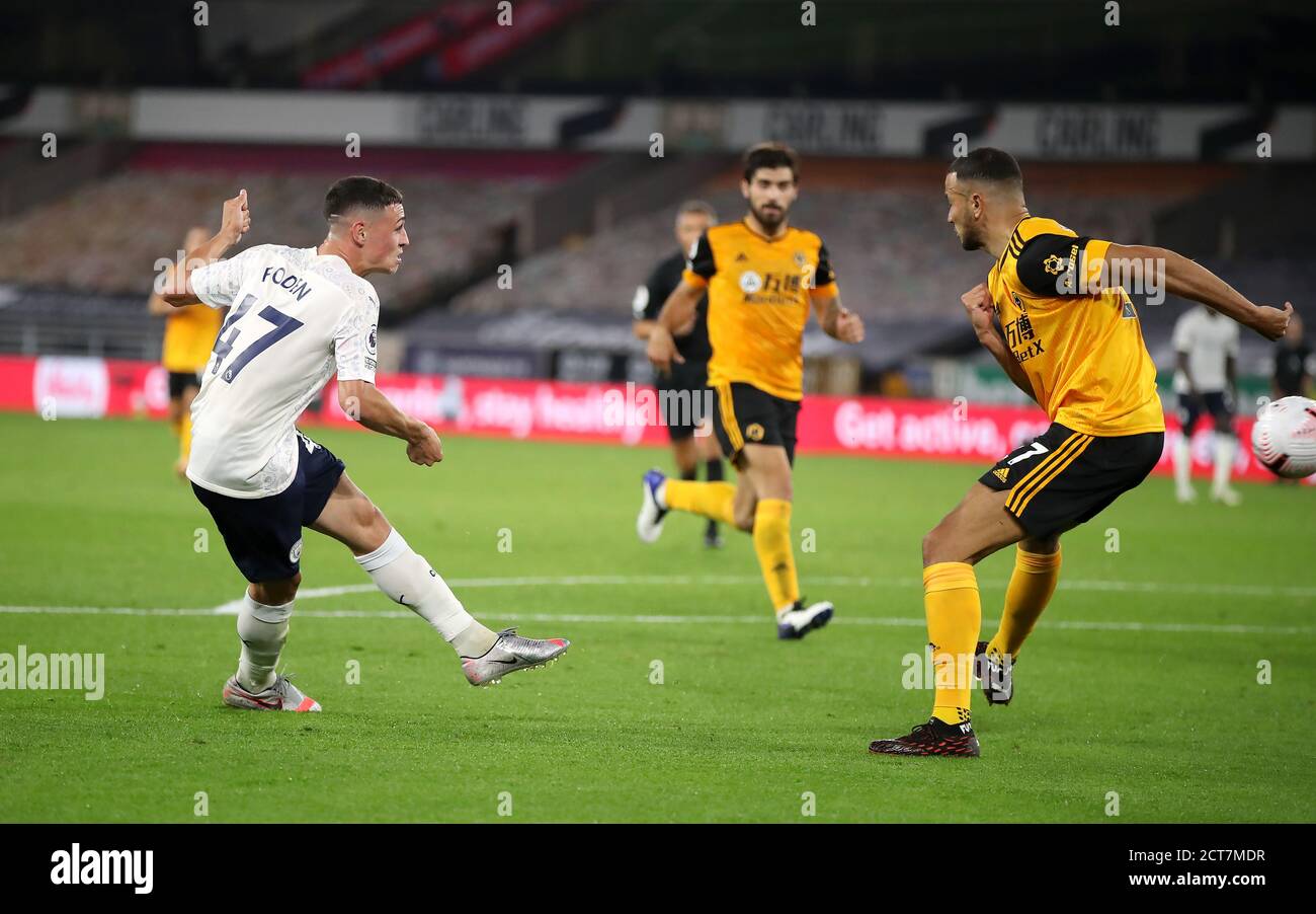 Manchester City's Phil Foden has a shot on goal during the Premier League match at Molineux, Wolverhampton. Stock Photo