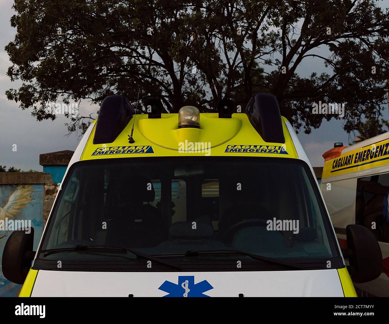 Front view white and yellow ambulance Stock Photo